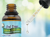 Nutraceutical drops for oral consumption inside a dropper.