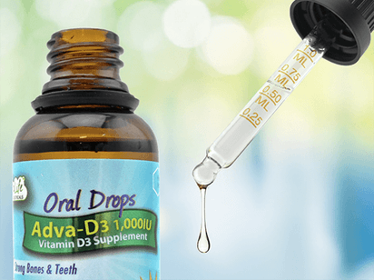 Nutraceutical drops for oral consumption inside a dropper.